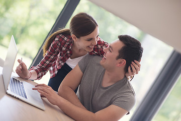 Image showing happy young couple buying online