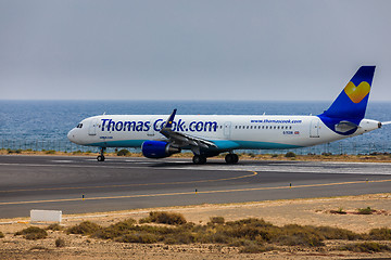 Image showing ARECIFE, SPAIN - APRIL, 16 2017: AirBus A321 of ThomasCook.com w