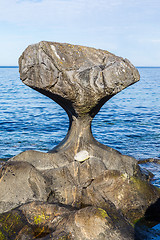 Image showing  Kannesteinen is a special shaped stone located on the shore of 