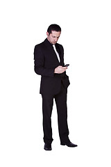 Image showing Businessman Texting On His Cell Phone