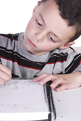 Image showing Little Cute Boy Practicing His Writing Skills