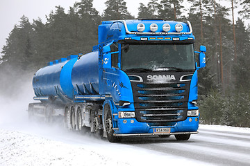 Image showing Blue Scania Tank Truck on Snowy Road