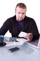 Image showing Young Casual Businessman Working at his Desk