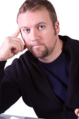 Image showing Close up on a Man with his Hand on his Temple