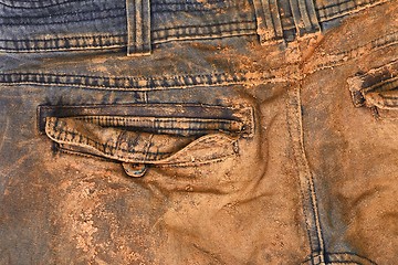 Image showing Trousers with mud