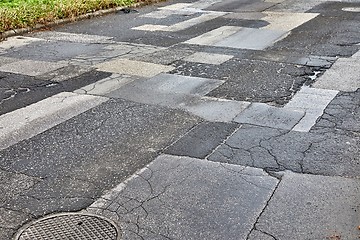 Image showing Patched broken road