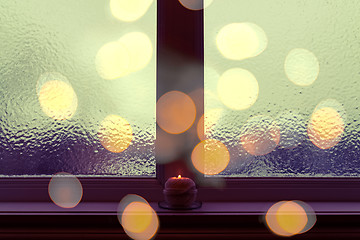 Image showing Frosted window in dark evening light