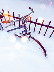 Image showing Bicycle in snow, with bokeh light effect