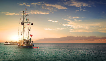 Image showing Sailboat at sunny sunset