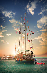 Image showing Wooden sailboat at sunset