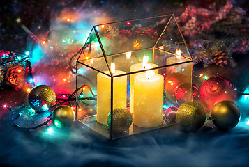 Image showing Row of christmas candles on red background