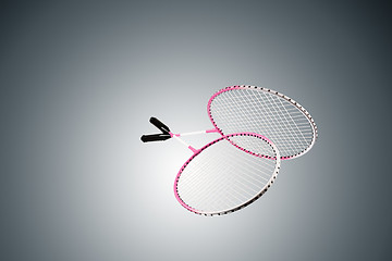 Image showing Color photo of two rackets for badminton