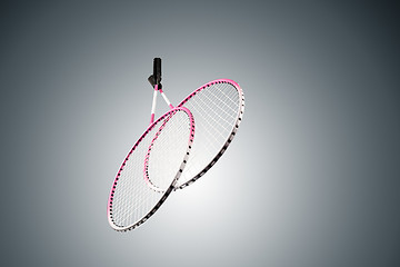 Image showing Color photo of two rackets for badminton