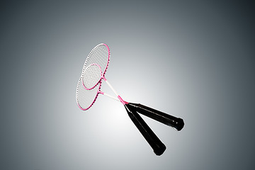 Image showing Color photo of two rackets for badminton