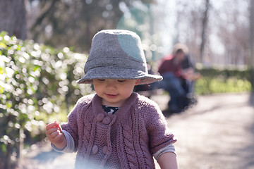 Image showing The first steps of the kid in the big world.