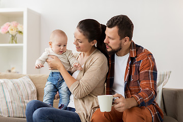 Image showing happy family with baby at home