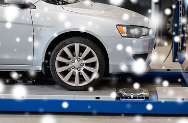 Image showing car on lift at repair station