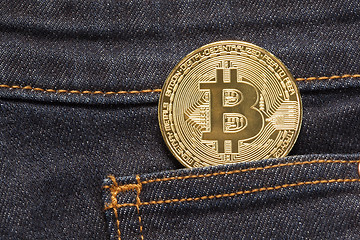 Image showing Bitcoin Physical Coin In Denim Pocket