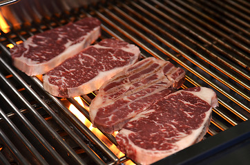 Image showing Beef steaks on the grill