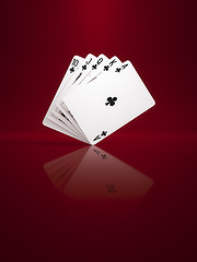 Image showing some poker cards on a background red