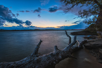 Image showing Landscape with sunset and snag