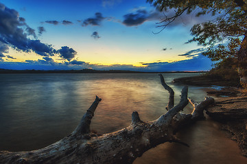 Image showing Landscape with sunset and snag