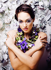 Image showing floral face art with anemone in jewelry, sensual young brunette 