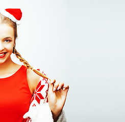 Image showing young pretty happy smiling blond woman on christmas in santas re