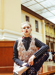 Image showing young attractive fashion lady on railway station waiting, vintag