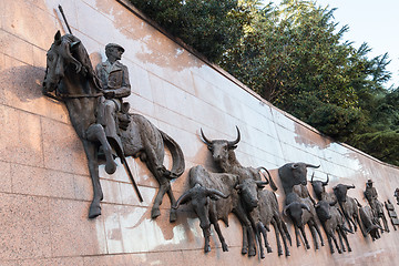 Image showing Wall statuee \'Run of Bulls\' at the Plaza de Toros de Las Ventas, Madrid, Spain.