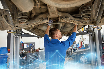 Image showing mechanic man or smith repairing car at workshop