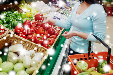 Image showing customer buying peppers at grocery store