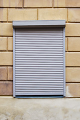 Image showing window with blinds on the wall