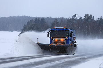 Image showing Snowplow Clears Highway in Snowfall