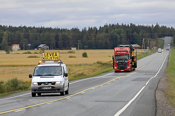 Image showing Pilot Vehicle Leads Wide Load Transport