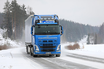 Image showing Blue Volvo FH Semi on Winter Road