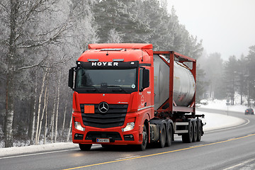 Image showing Red Mercedes-Benz Actros Tank Container Transport in Winter