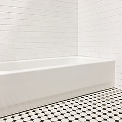 Image showing New bathroom with ceramic tile walls and floor