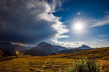 Image showing A storm cloud is coming in the sun. The beginning of the storm.