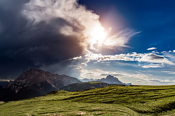 Image showing A storm cloud is coming in the sun. The beginning of the storm.