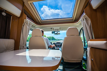 Image showing Man driving on a road in the Camper Van RV