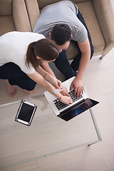 Image showing happy young couple buying online