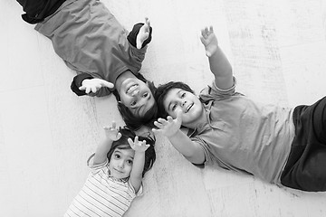 Image showing young boys having fun on the floor