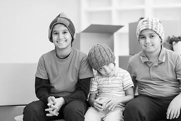 Image showing boys with cardboard boxes around them