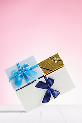 Image showing Gift box wrapped in recycled paper with ribbon bow