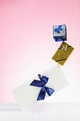 Image showing Gift box wrapped in recycled paper with ribbon bow