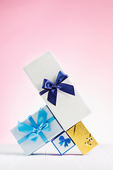 Image showing Gift box wrapped in recycled paper with ribbon bow