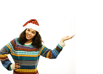 Image showing young pretty african american girl in red christmas hat isolated
