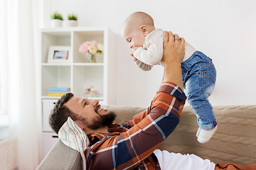 Image showing happy father with little baby boy at home