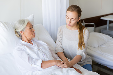 Image showing daughter visiting her senior mother at hospital